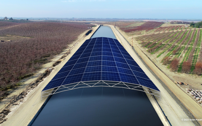 Rendering of solar panels over wide spanning irrigation canal.