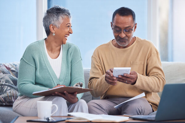 Elderly couple going over their budget happily