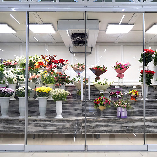 Flowers for sale in a special cold room with air conditioning.