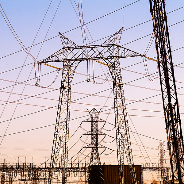High voltage electricity towers at a substation.