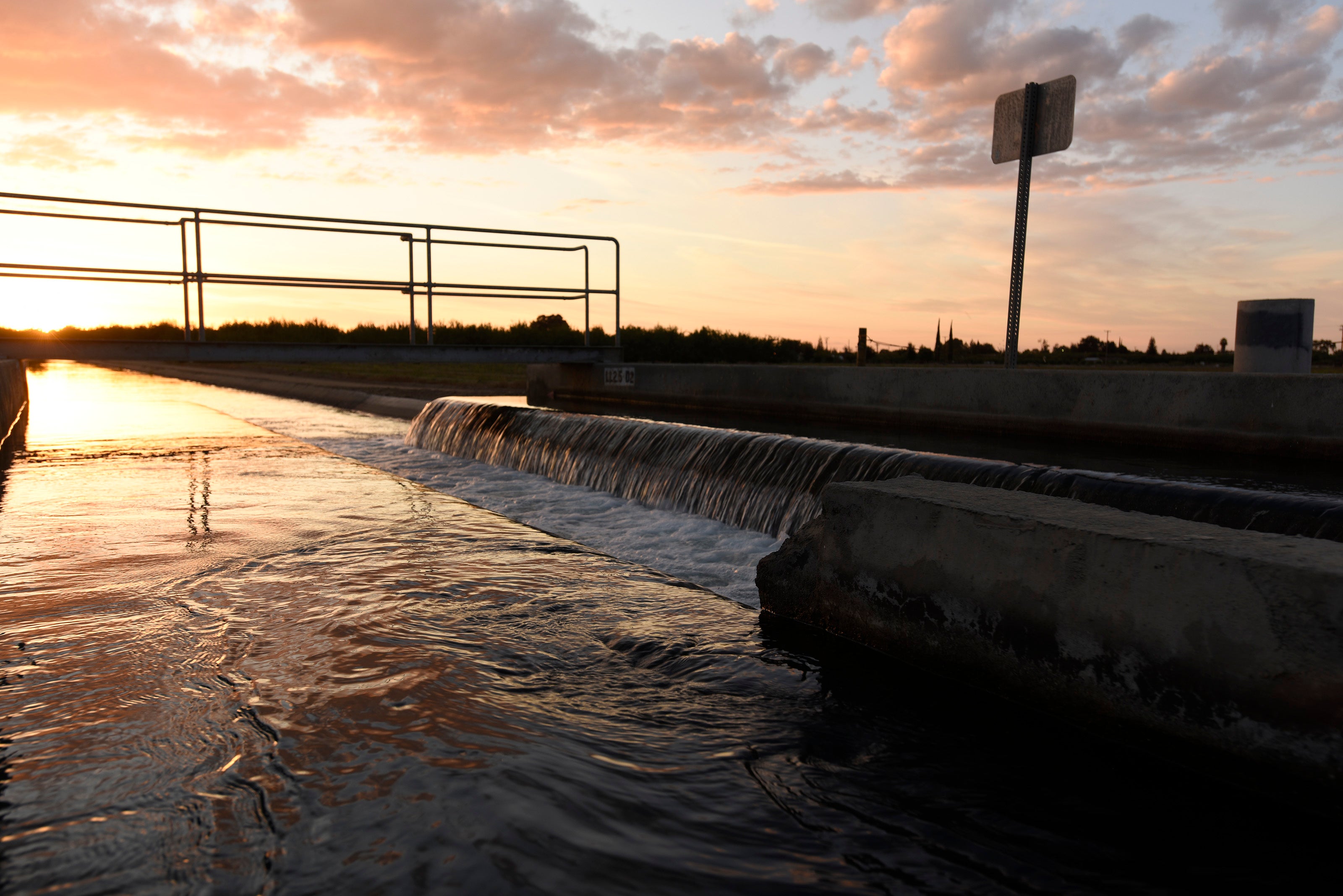 Irrigation Canal with water at sunset.